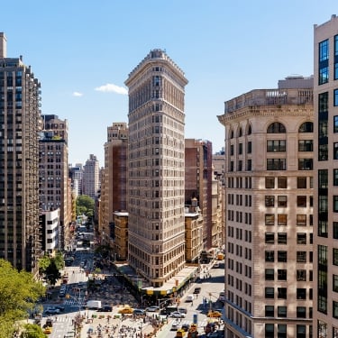Aerial view of New York skyline on a sunny day with Flatiron building, New York, USA.