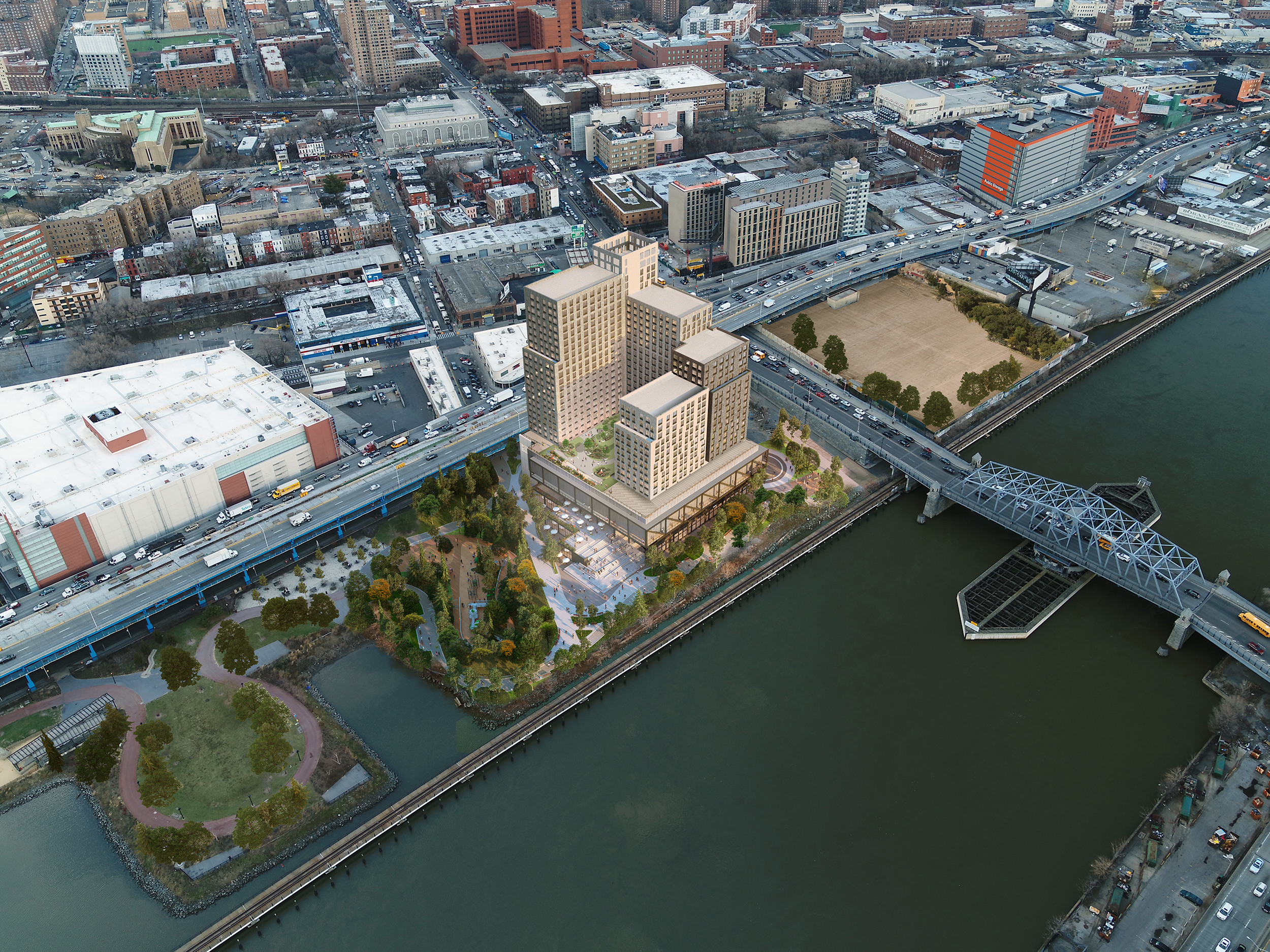 Aerial rendering of Bronx Point featuring a large multi-building complex by a river, adjacent to a park, bridges, and a highway, surrounded by New York City buildings and green spaces.