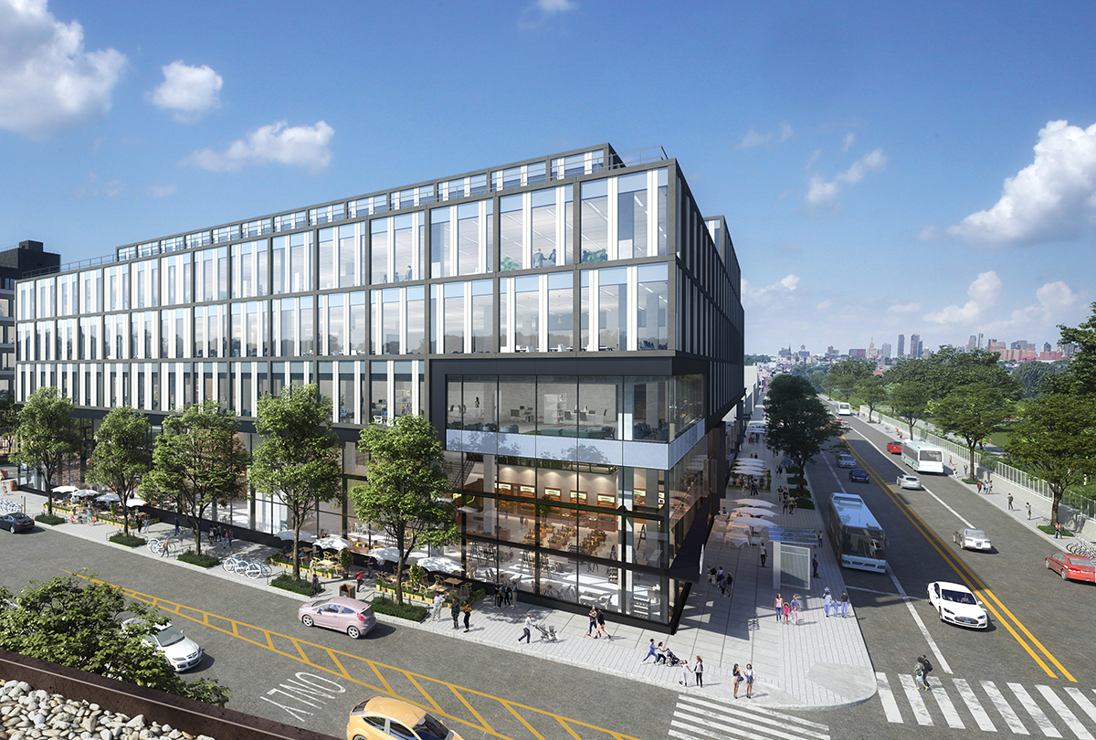 Modern multi-story glass office building, 2440 Fulton Street, on a street in East New York, Brooklyn with trees, people walking, cars parked, buses driving, and a clear blue sky above. Urban skyline is visible in the distance.