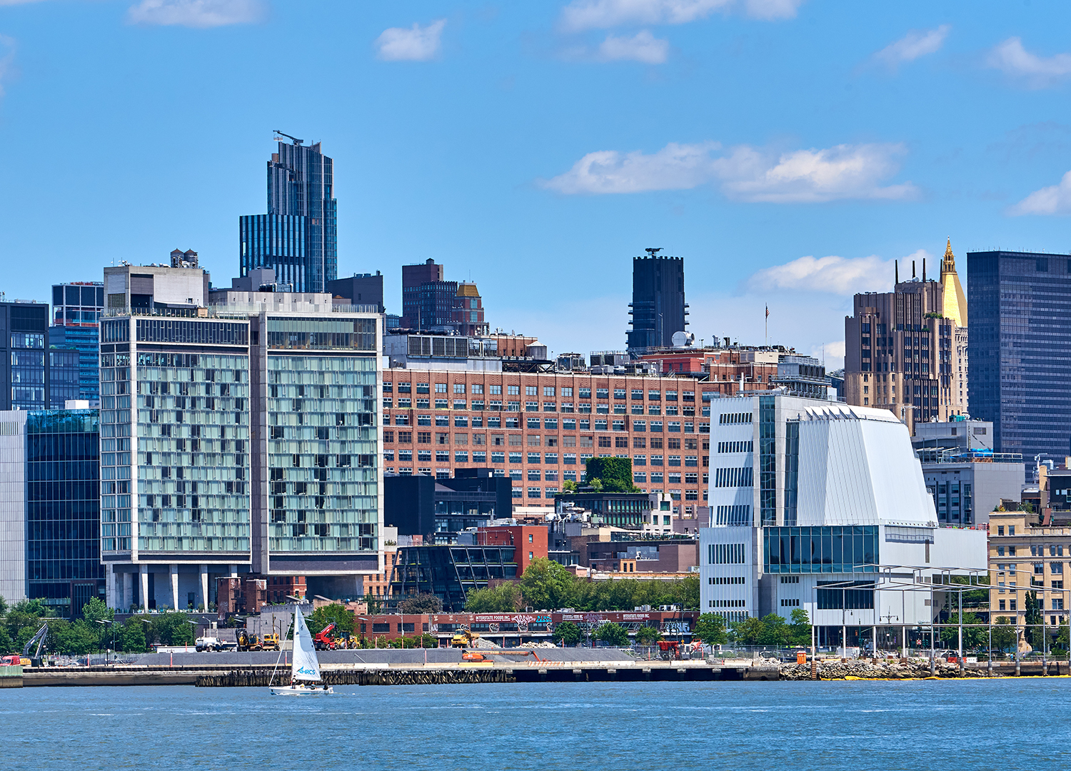 The Standard, High Line Hotel, left, and the Whitney Art Museum, in the West Village and Meatpacking District in lower Manhattan, NYC are seen from the Hudson River. The Whitney building was designed by Renzo Piano and its location marks the southern entrance to The High Line park.