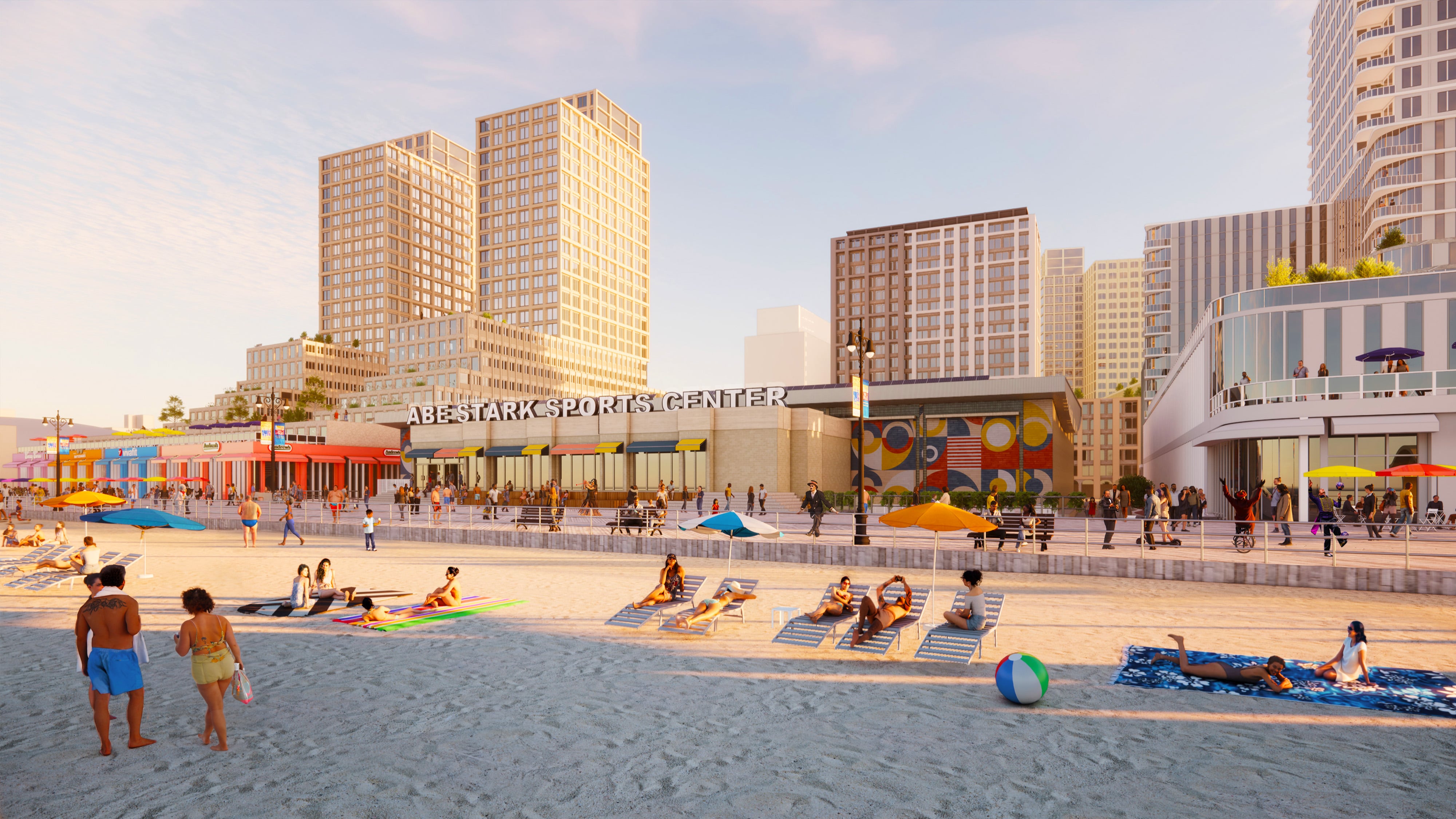 Rendering of Coney Island showing people relaxing on a sandy beach with umbrellas, towels, and a beach ball near a cityscape with tall buildings and Abe Stark Sports Center. The sky is clear, and the atmosphere is lively and sunny.