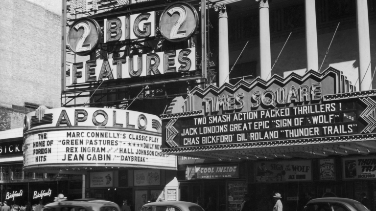 The Apollo and Times Square Theatres, circa 1941. Image: Getty.