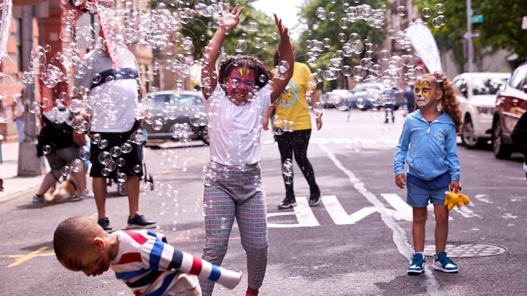 Children playing with bubbles