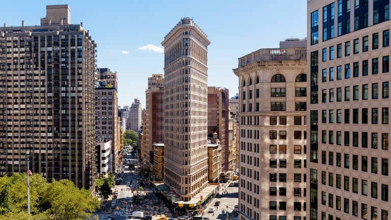 Aerial view of New York skyline on a sunny day with Flatiron building, New York, USA. Aerial view of New York skyline on a sunny day with Flatiron building, New York, USA.