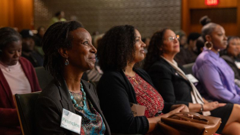 Black women attending a tech conference.