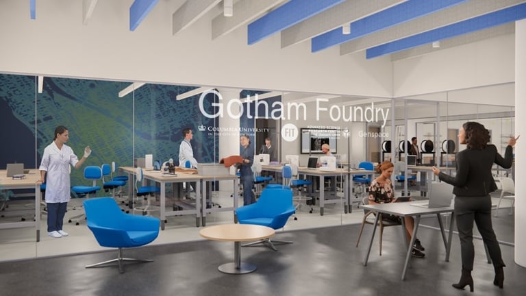 A modern, open lab space named Gotham Foundry with people working at desks and tables, some in lab coats. The setting is bright, with large windows, blue chairs, and collaborative work areas. A modern, open lab space named Gotham Foundry with people working at desks and tables, some in lab coats. The setting is bright, with large windows, blue chairs, and collaborative work areas.