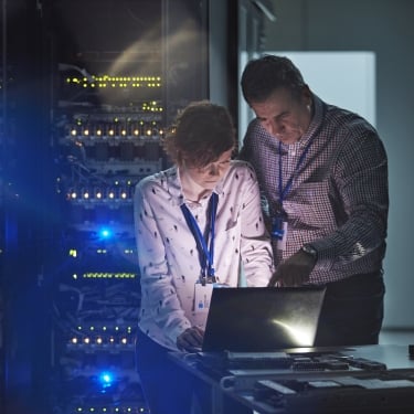 IT Coworkers. Photo by Agnieszka Olek/Getty Images.