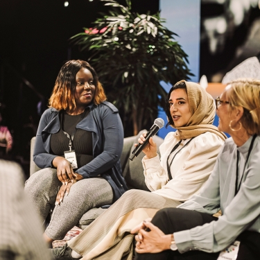 Women.NYC Network advisors speaking at a panel event.