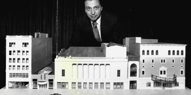 Douglas Durst stands behind a scare model of the Times Square Theatre and New Victory Theater. The Durst Organization would eventually build the first building as part of the 42nd Street Development Project, across the street at 4 Times Square. Image: Getty.