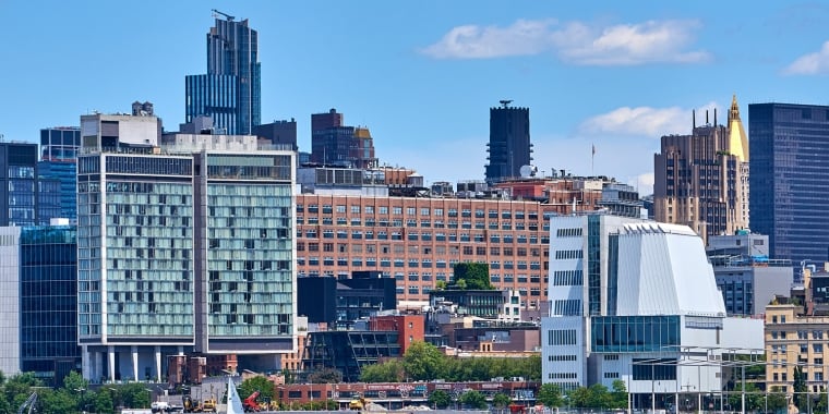 The Standard, High Line Hotel, left, and the Whitney Art Museum, in the West Village and Meatpacking District in lower Manhattan, NYC are seen from the Hudson River. The Whitney building was designed by Renzo Piano and its location marks the southern entrance to The High Line park.