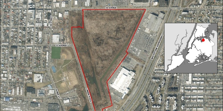 Aerial view of former Flushing Airport with a large, triangular, brown patch outlined in red. Inset map shows location in New York City. Roads and buildings surround the outlined area.