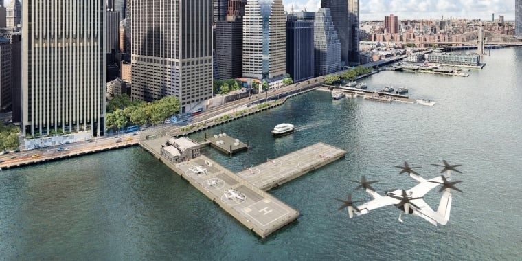 Aerial rendering of downtown Manhattan heliport with a flying air taxi above water, surrounded by New York City skyscrapers and a ferry at the dock.
