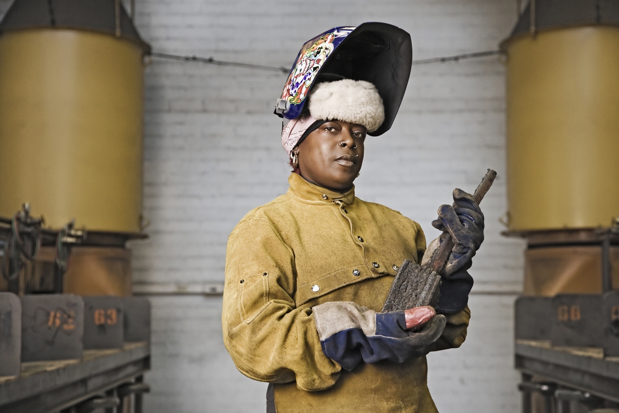 Portrait of a welder in their studio. Photo by Getty Images.