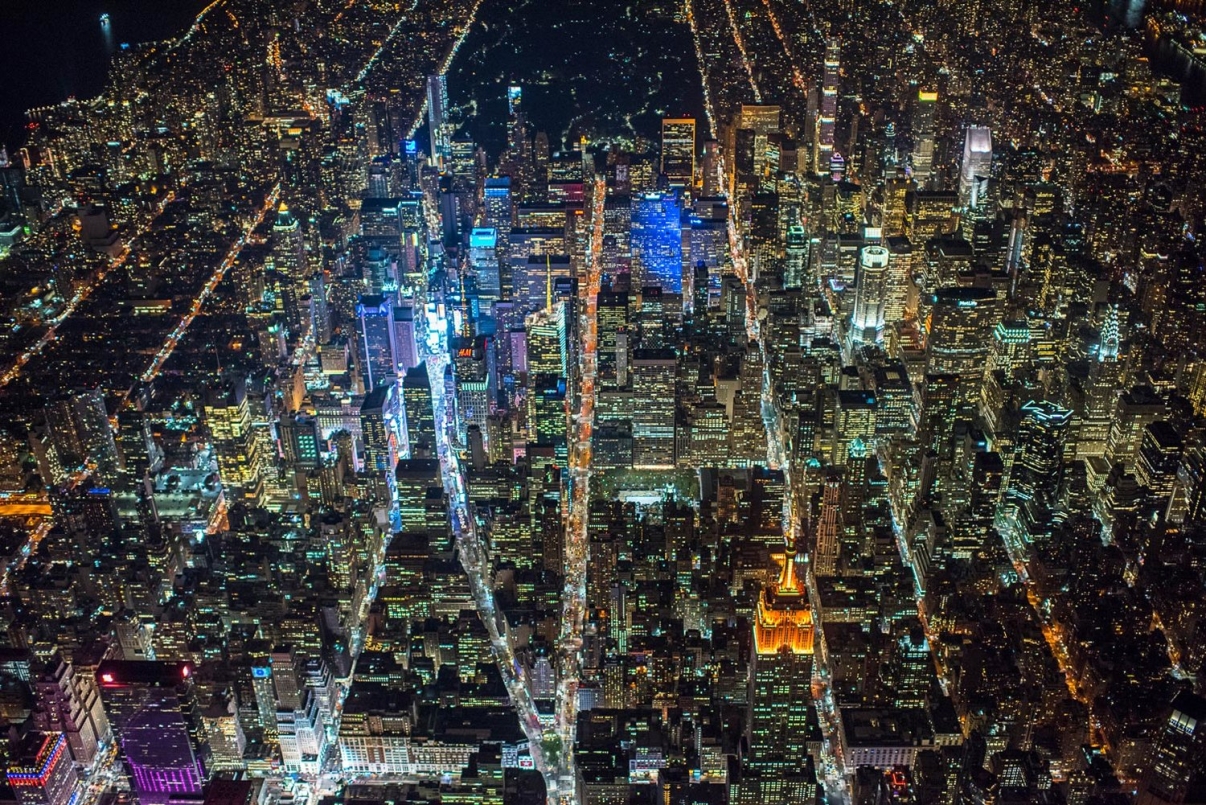 The lights of Times Square shine bright. The lights of Times Square shine bright.