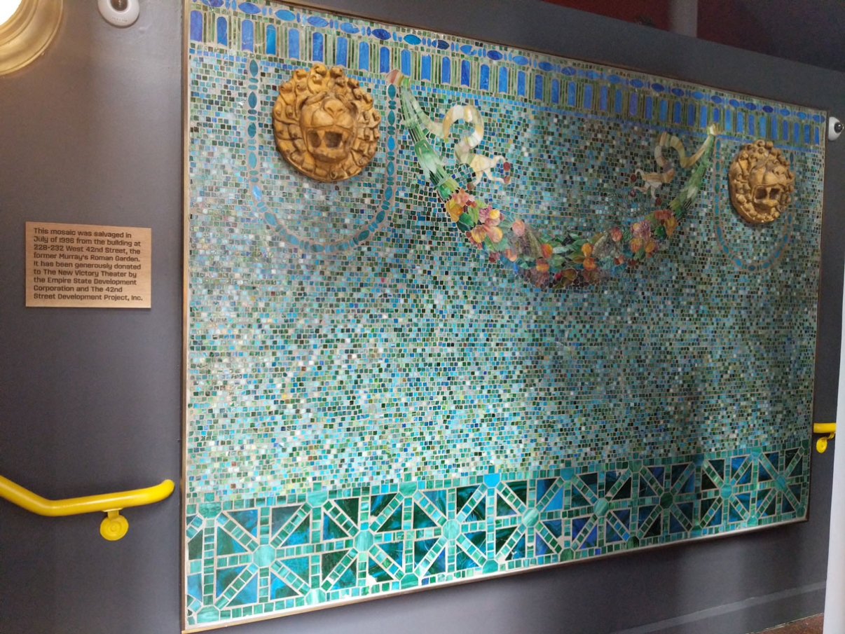A glass mosaic from Murray’s Roman Garden, now in the entryway of the New Victory Theater. Image: New Victory Theater
