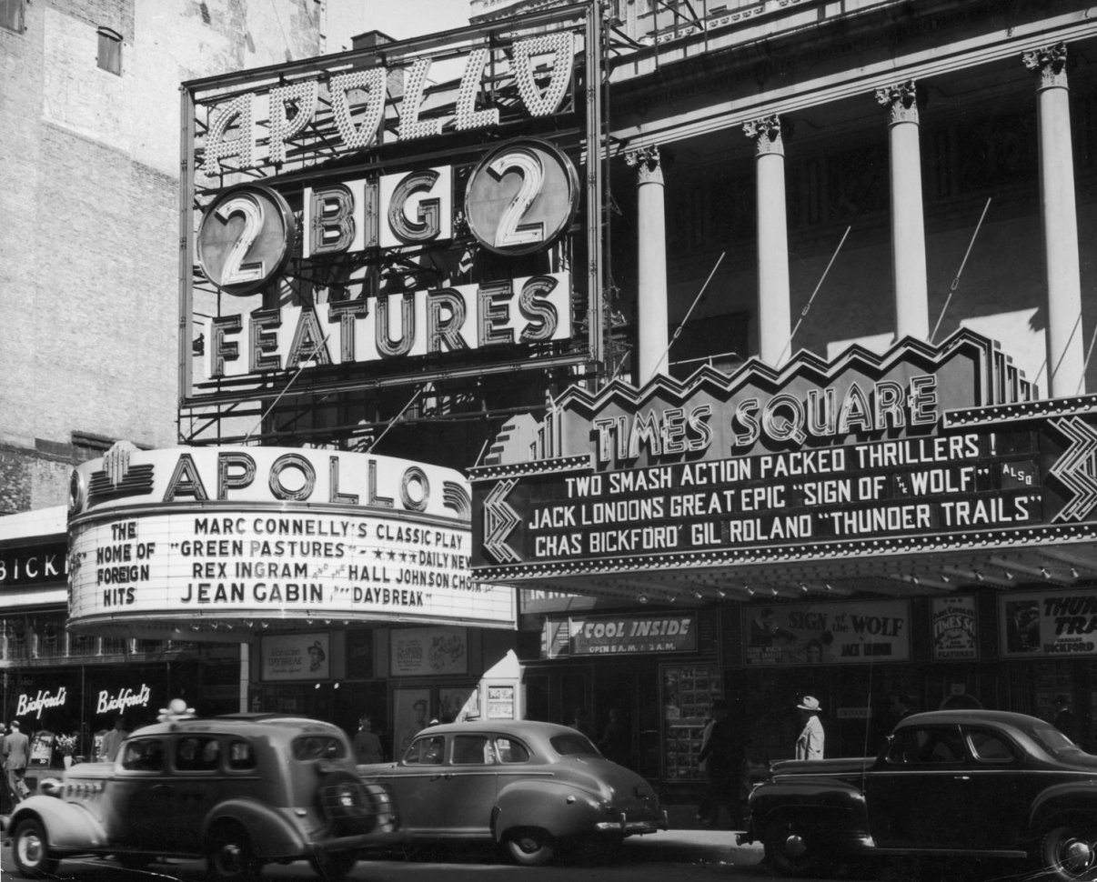 The Apollo and Times Square Theatres, circa 1941. Image: Getty.