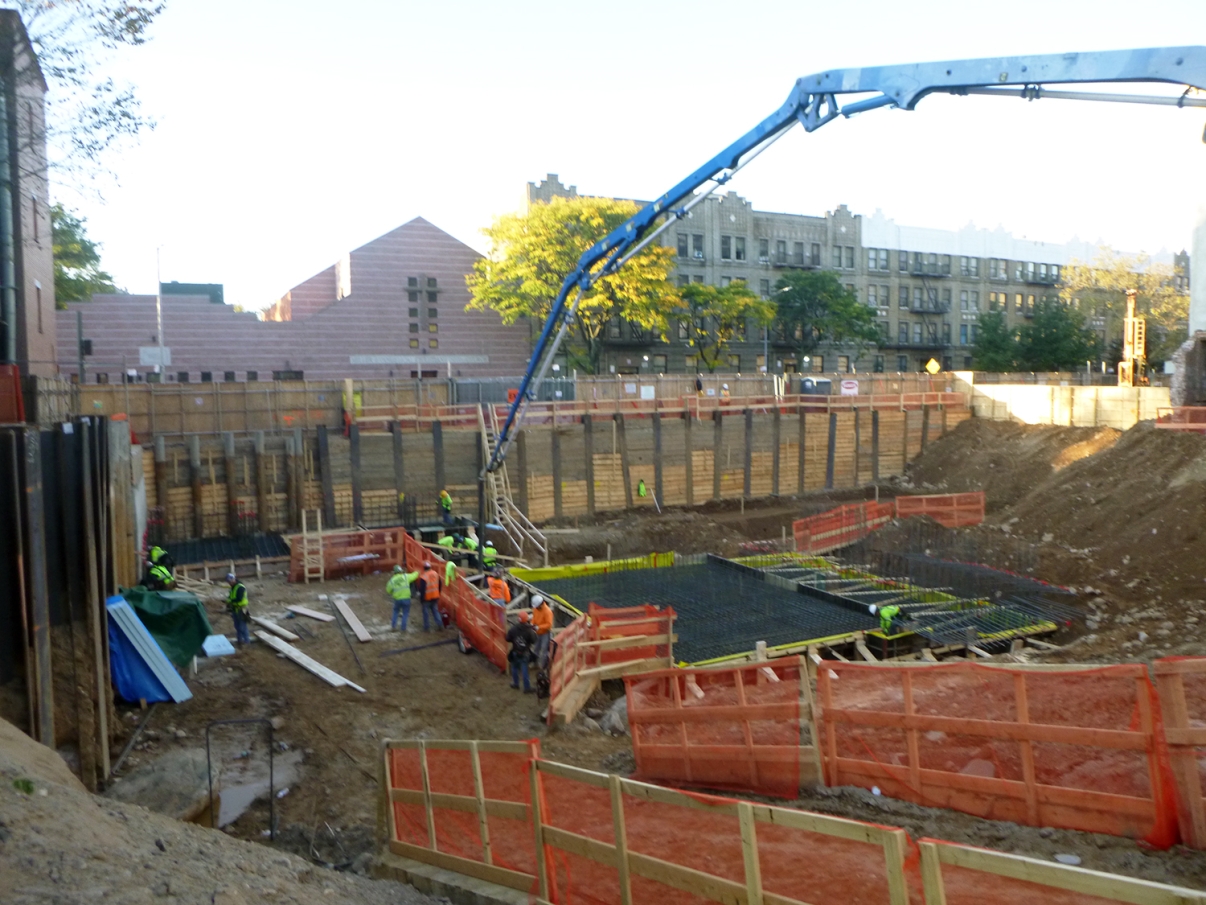 Construction crew on site at the Major Owens Center