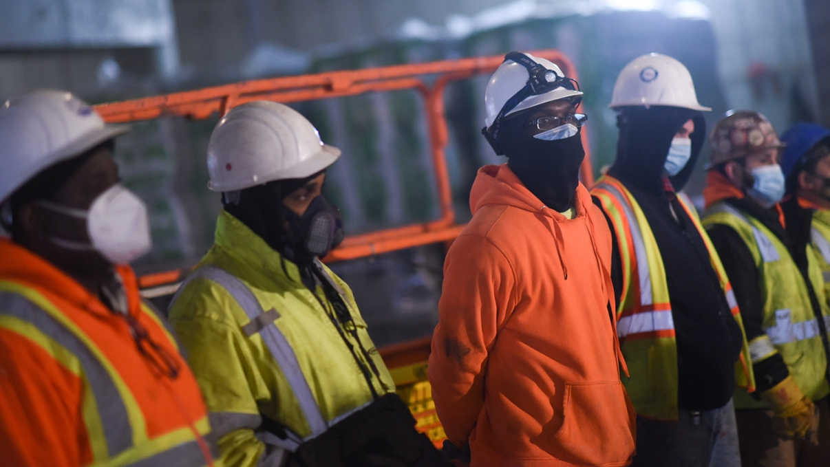 Crews on site at the topping off ceremony for the Beach 21st Street affordable housing project, courtesy of Michael Appleton/Mayoral Photography Office