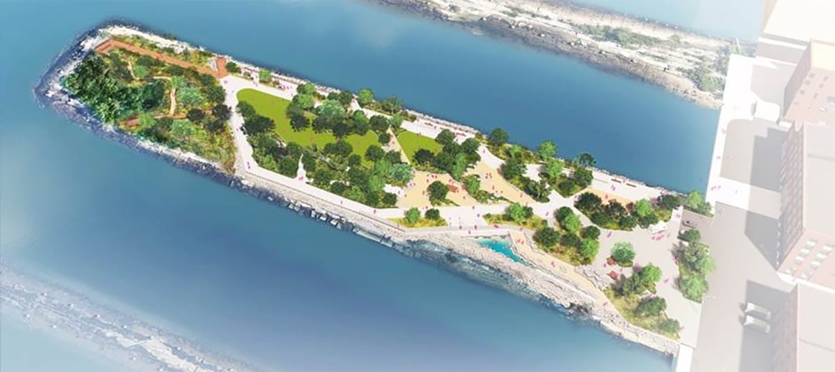 Aerial view of a lush park on Pier 6 featuring a serene small island surrounded by greenery and pathways.